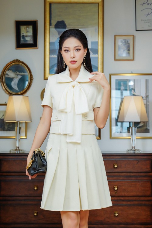 Cream Knife Pleated Mini Raw Skirt